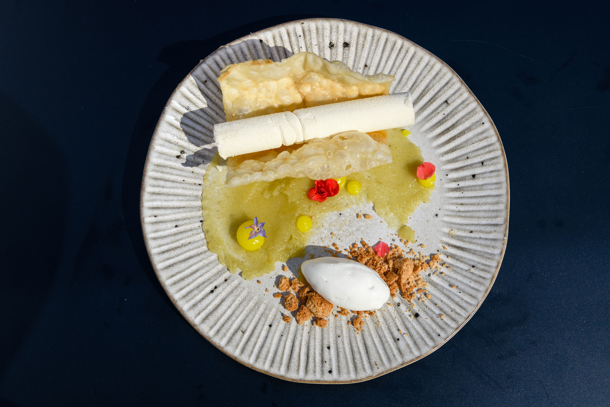 Xerotigano (traditional fried dough strips) with cinnamon-scented white ...